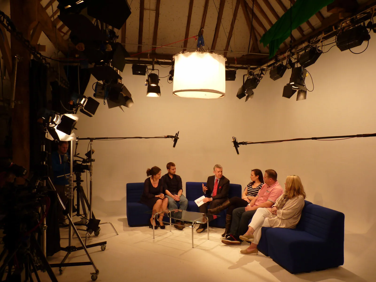 The White Space at Granary Digital: a bright, light-filled photography space inside the 16th-century barn near Chichester, set up with a panel arrangement and used for professional headshots and product photography.